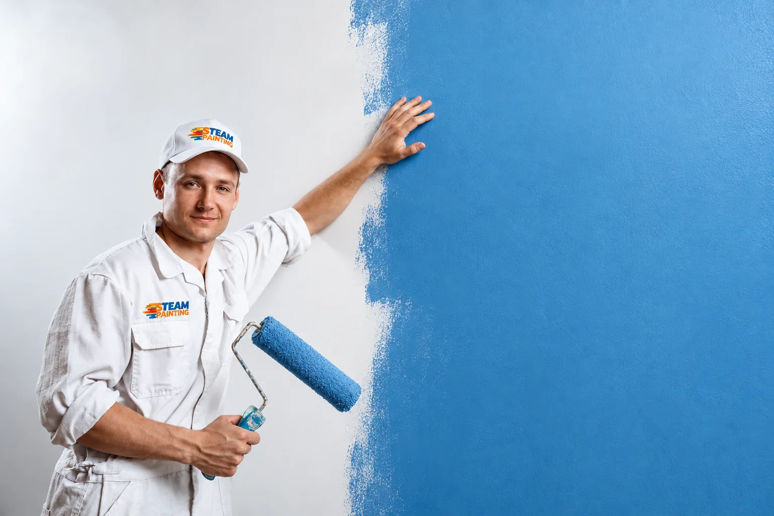 S-Team painter applying blue paint